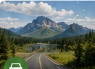 A road curving toward snow-capped mountains